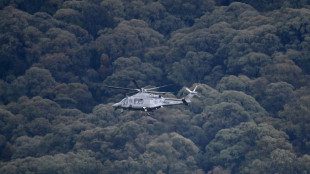 Police search Australian bush for gunman after two officers killed