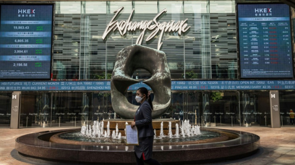 Stocks mostly fall as Trump ramps up tariff threats