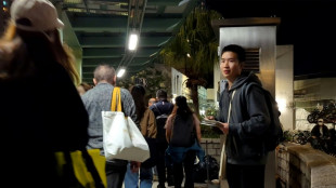 Hong Kong student urging probe into deadly fire leaves police station