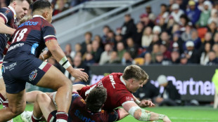 Freeman at the double as Lions sweep past Queensland Reds 52-12