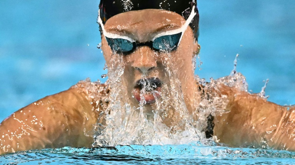 McIntosh makes golden start as Australia win world relay double