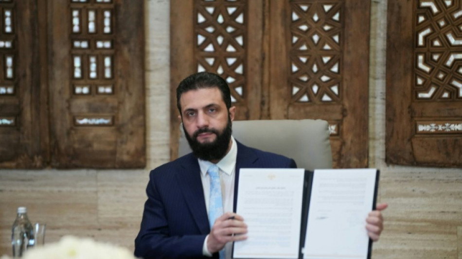 Syria's leader agrees truce deal with Kurds after govt troops advance