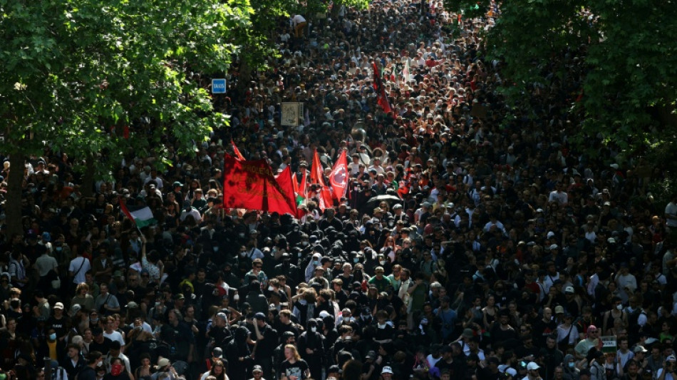 300,000 rally across France for May 1, union says