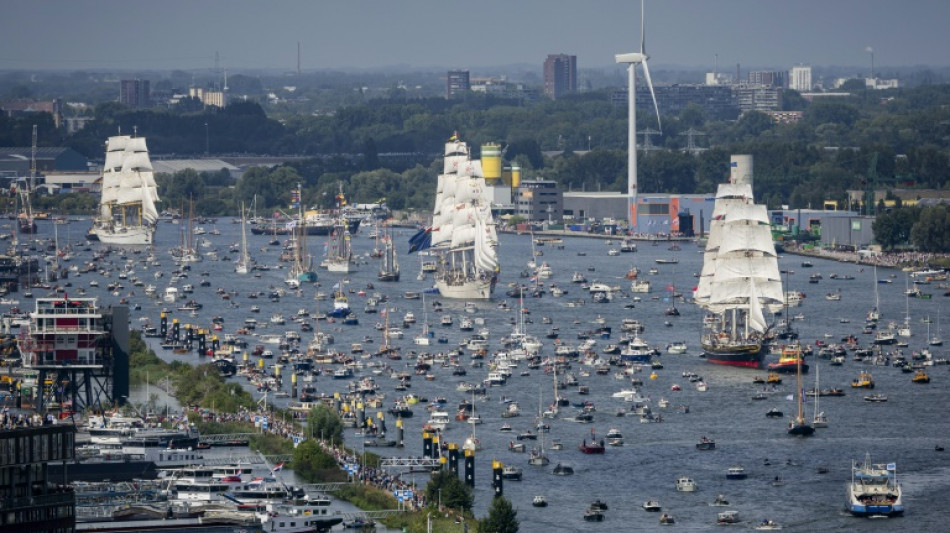 Tall ships sail into Amsterdam for giant maritime festival