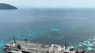 First bodies of Philippines ferry fire victims land as toll hits 35