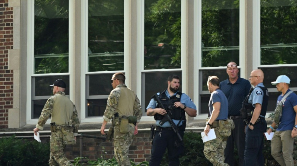 Motive probed for US shooting that killed two children, injured 17