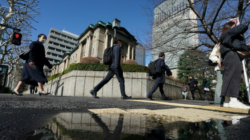 Tokyo stocks rise as BoJ holds rates steady