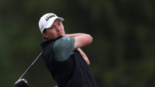 American McNealy grabs PGA lead at difficult Aronimink