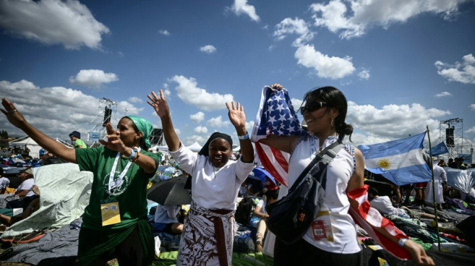 Elation as pope arrives by helicopter to open-air youth vigil in Rome