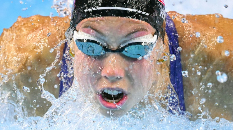 Walsh defies illness in US camp to win butterfly world gold