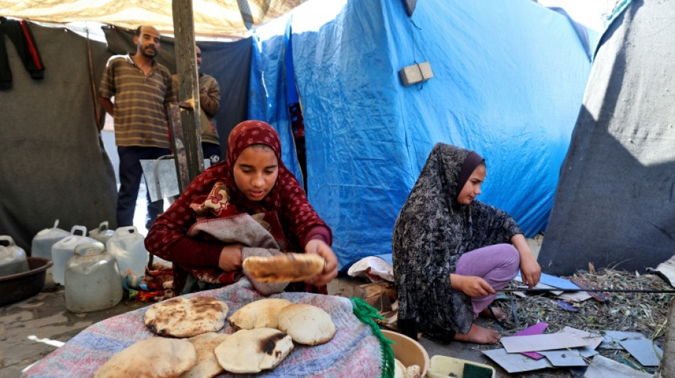 Volunt&aacute;rios movem c&eacute;us e terras para assar p&atilde;o em Gaza