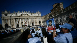 Huge crowds at the Vatican as teen becomes first millennial saint