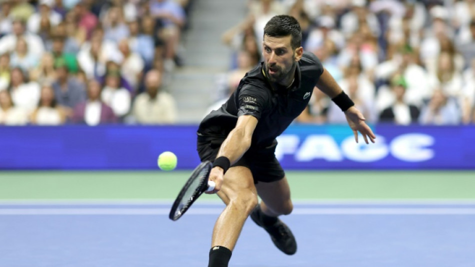 Djokovic shrugs off blisters to advance at US Open