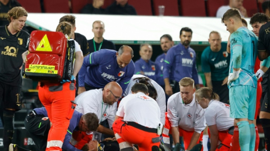 Augsburg's Fellhauer leaves hospital after concussion against Bayern