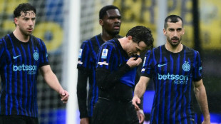 Livid Inter's Serie A title bid hit, McTominay returns in Napoli win