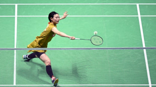Miyazaki overcomes 'anxiety' to win on badminton worlds debut