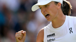 Swiatek destroys Anisimova 6-0, 6-0 to win first Wimbledon title