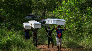 Philippine ferry fire death toll climbs to 76 as identification process begins