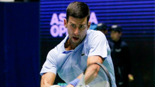 Djokovic into Astana final after surprise Medvedev retirement