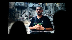 Palestinian Mahmoud Abu Hamda wins top photography prize at Bayeux