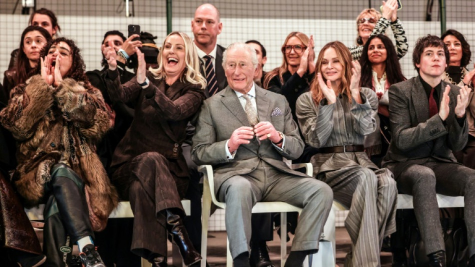 UK king opens London fashion week despite brother's arrest