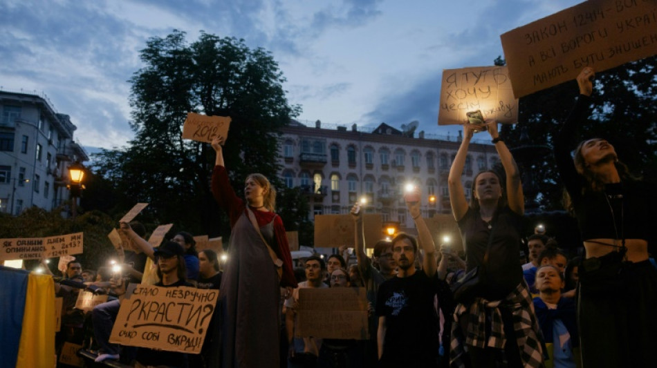 Ukraine curbs anti-corruption agencies, sparking rare protests