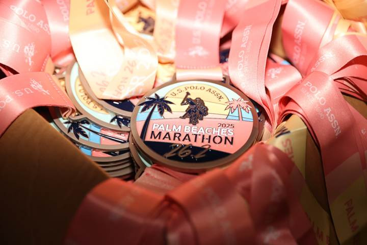 A group of medals in a boxAI-generated content may be incorrect.