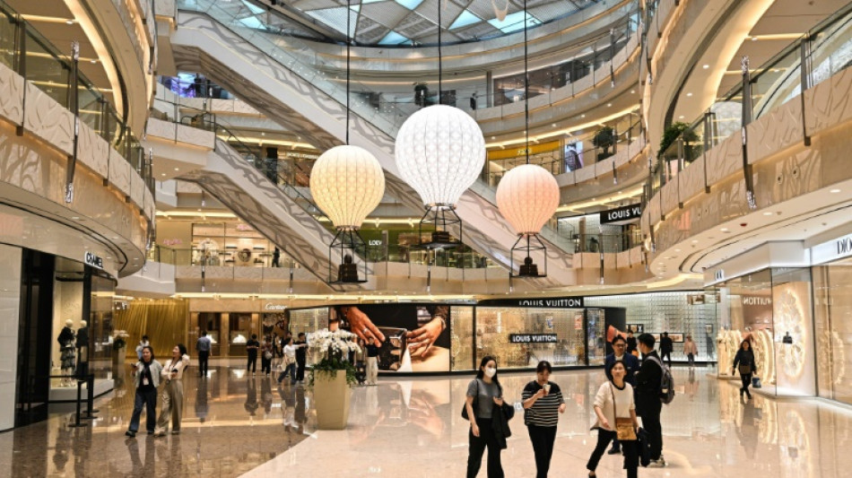 Beijing consumers mull spending habits as tariffs kick in