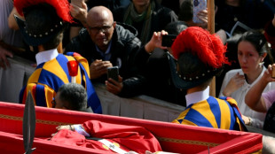 Tens of thousands bid farewell to Pope Francis as he lies in state