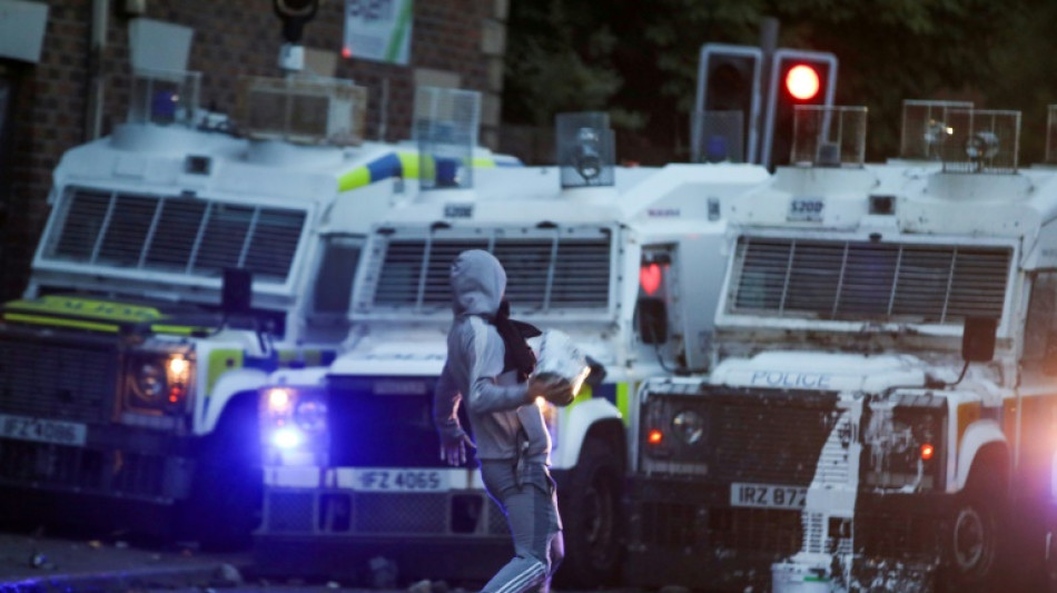 Tense standoff as N.Ireland town braces for third night of riots