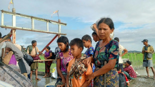Desperate Myanmar villagers scavenge for food as hunger bites