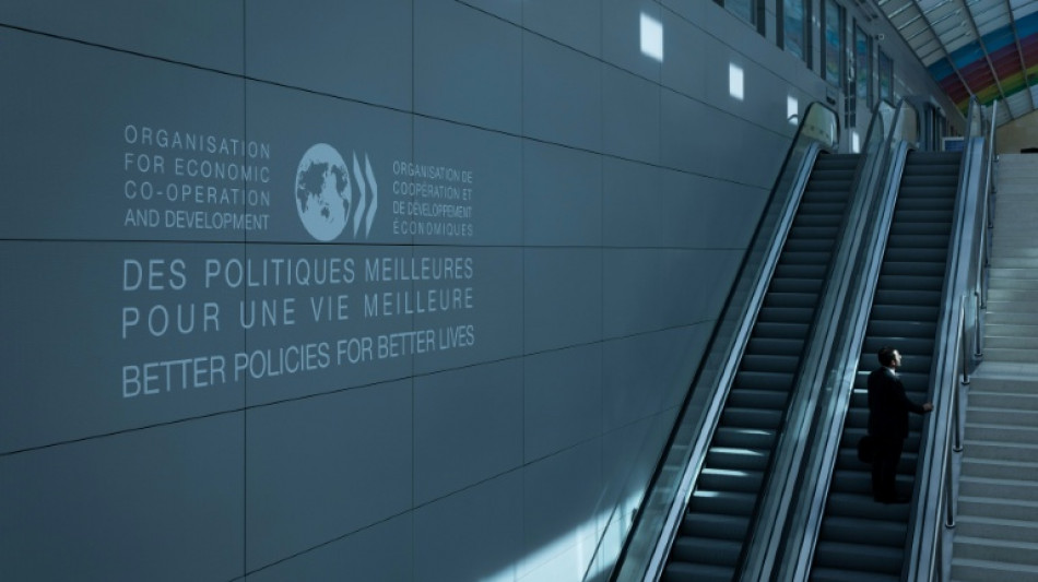 OECD ups world economic outlook as tariffs contained, for now