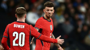Henderson backs England's White after Wembley boos