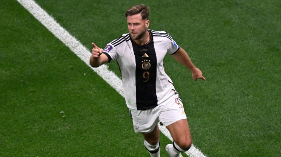 Gap-toothed assassin Fuellkrug digs Germany out of World Cup hole