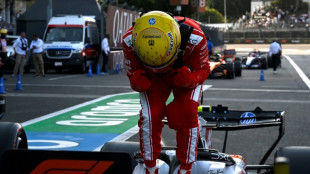 Hamilton takes record 105th pole and first for Ferrari, as Antonelli lurks