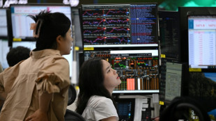 US equities gain as inflation report eases fear of rate rise